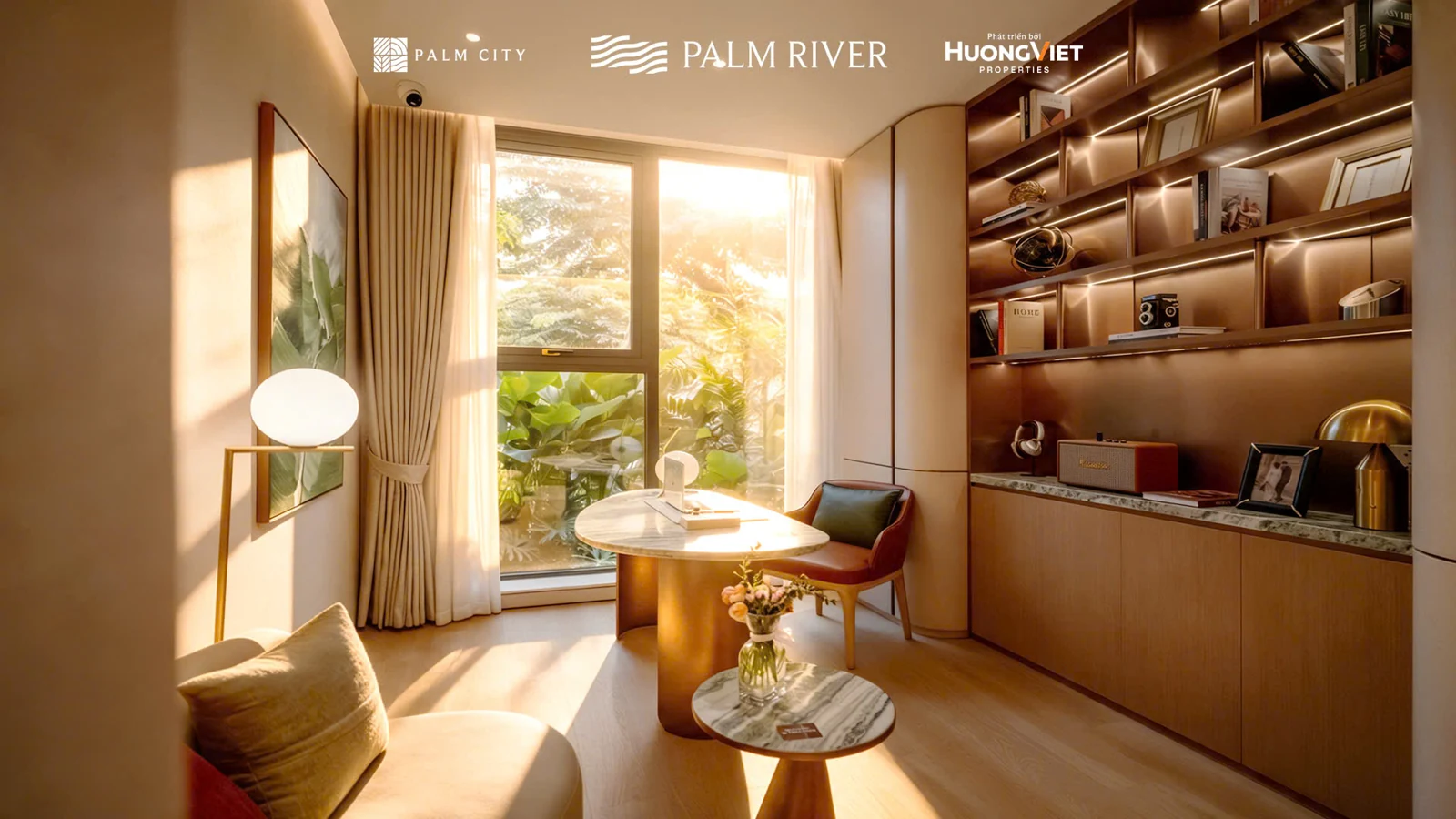 Nhà mẫu Palm River: góc đọc sách với ghế ngồi và hệ kệ trong căn mẫu 3PN Luxury.