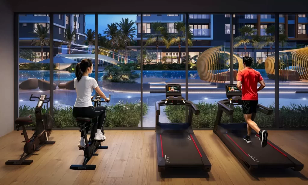 Phòng gym nhìn ra hồ bơi nội khu tại Gladia Heights